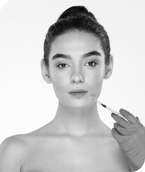 Woman holding syringe in hand for Profhilo Injectable treatment